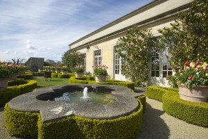 the-lost-orangery-with-pruned-topiary-trickling-fountains-faultless-lush-green-lawns-and-fragrant-rose-gardens.jpg